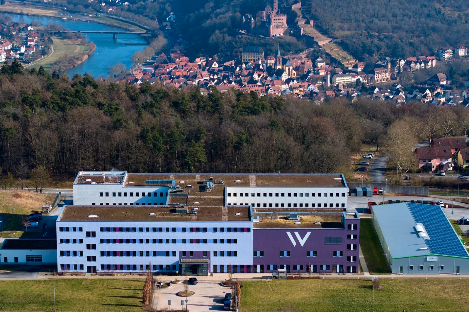 Aerial view of the Bürgerspital Wertheim with the town on the River Main behind it